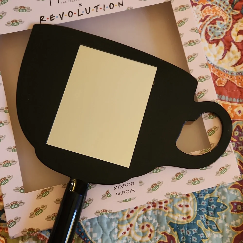 Friends revolution hand mirror